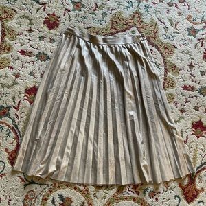 Maeve gold pleated skirt. Great for holiday parties.